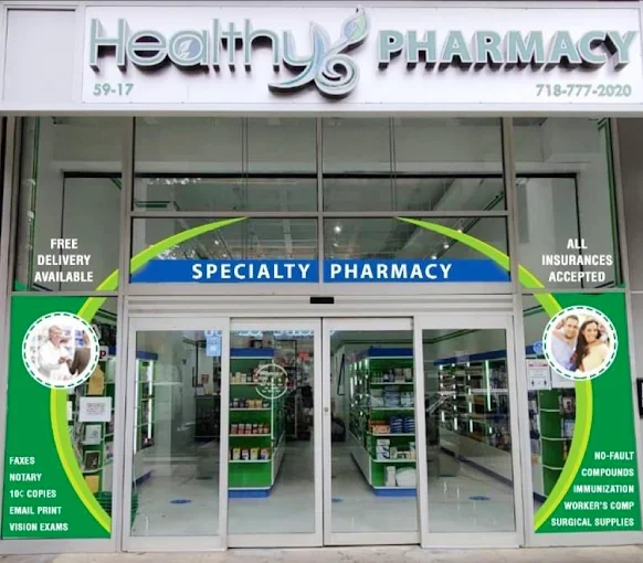 Modern specialty pharmacy entrance with clear glass doors.