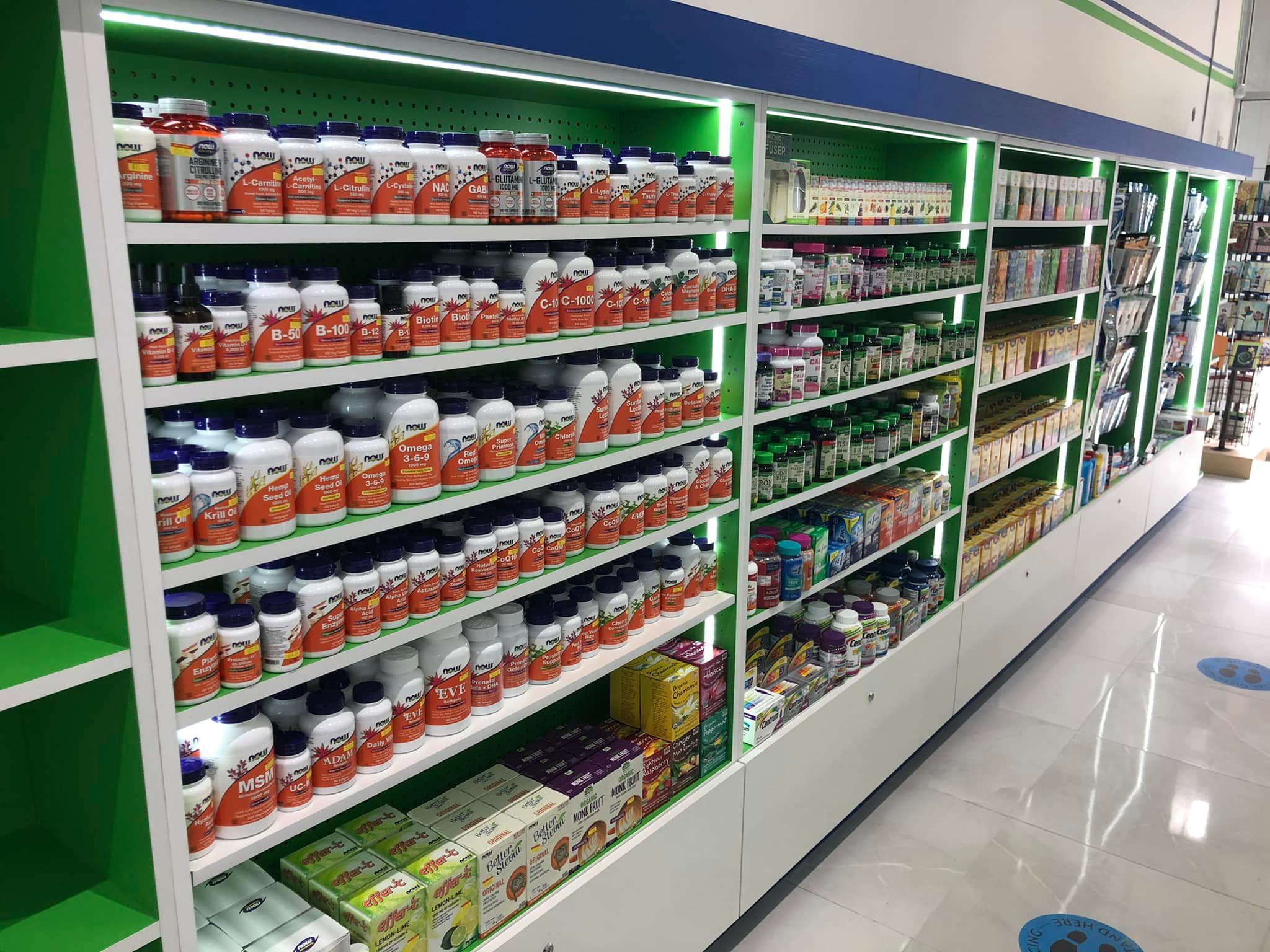 Shelves stocked with various nutritional supplements and vitamins in a store.